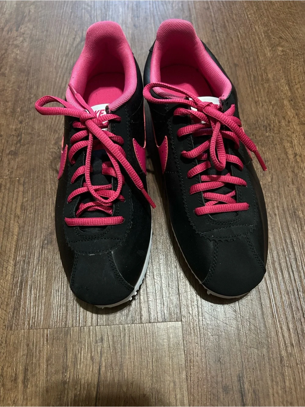 Nike Women’s Black and Hot Pink Low-Top Sneakers